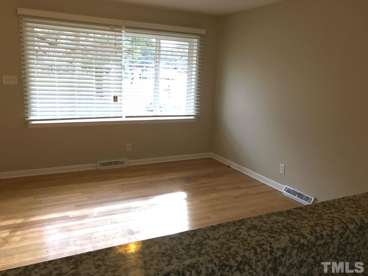 111 Barclay Road Durham, NC 27712 - Photo 16 of 21 a view of a room with wooden floor and a window