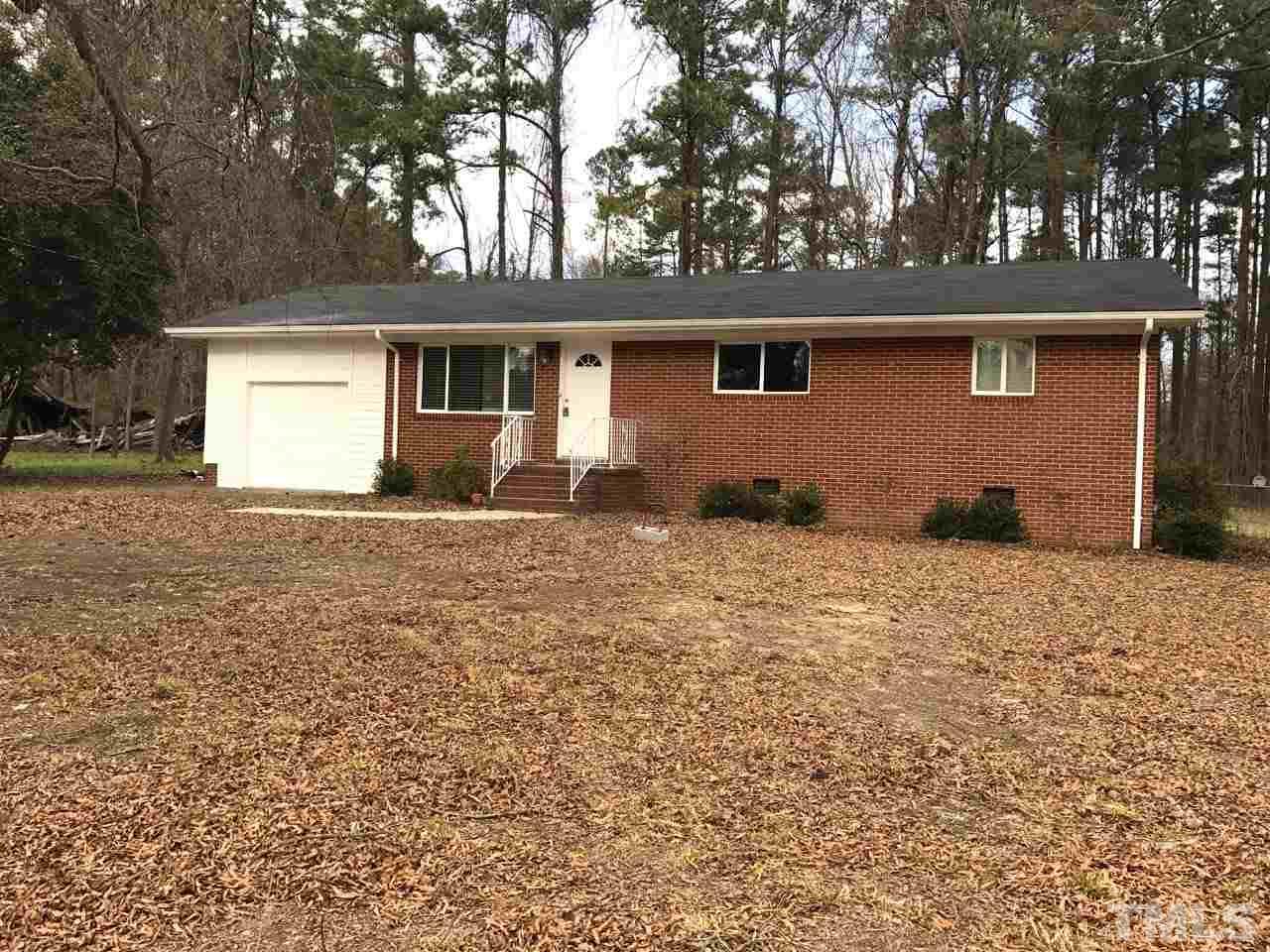 111 Barclay Road Durham, NC 27712 - Photo 19 of 21 a front view of a house with a yard