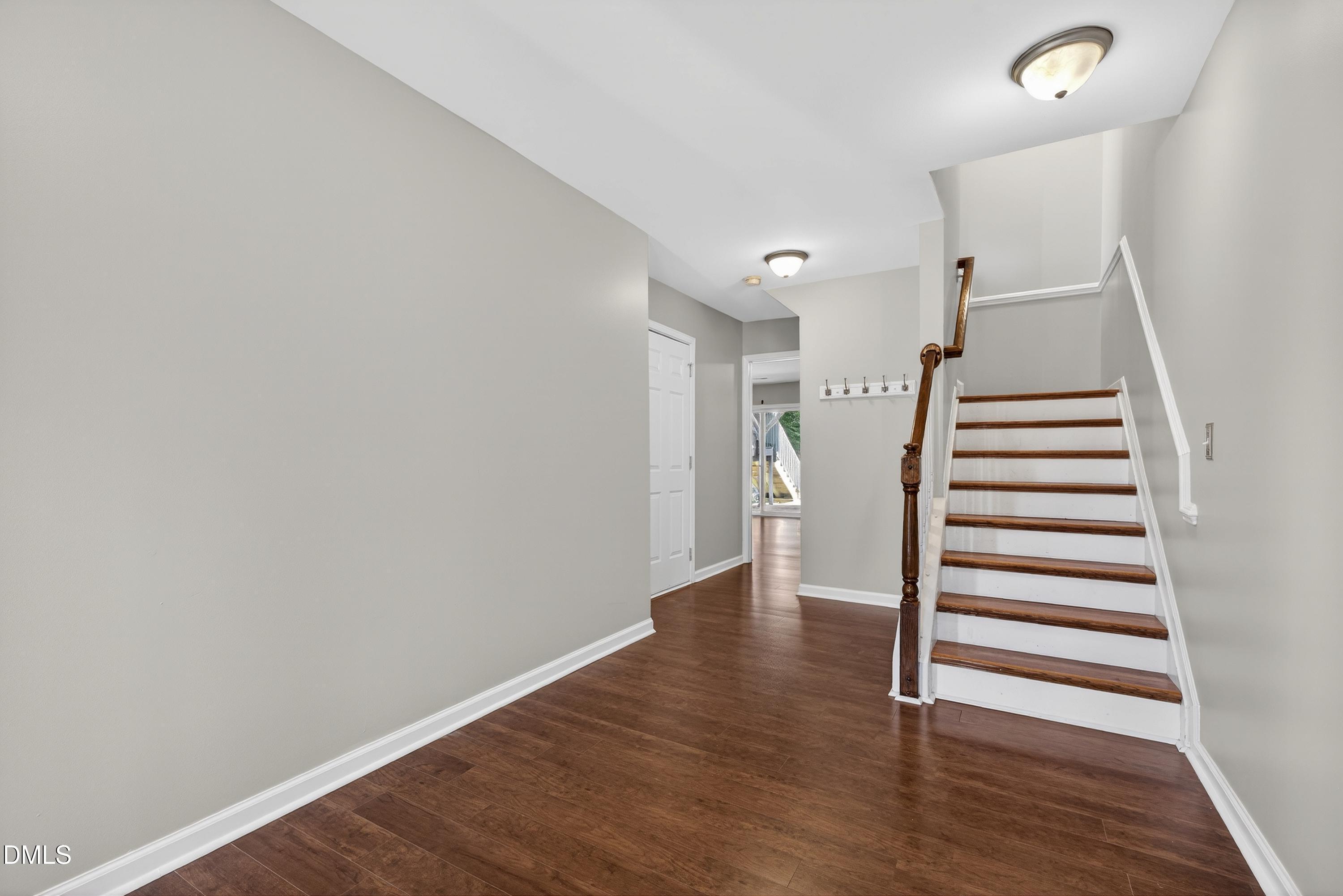 11830 Canemount Street Raleigh, NC 27614 - Photo 9 of 79 Stairs leading to 2nd floor with huge family room that opens to beautiful kitchen.