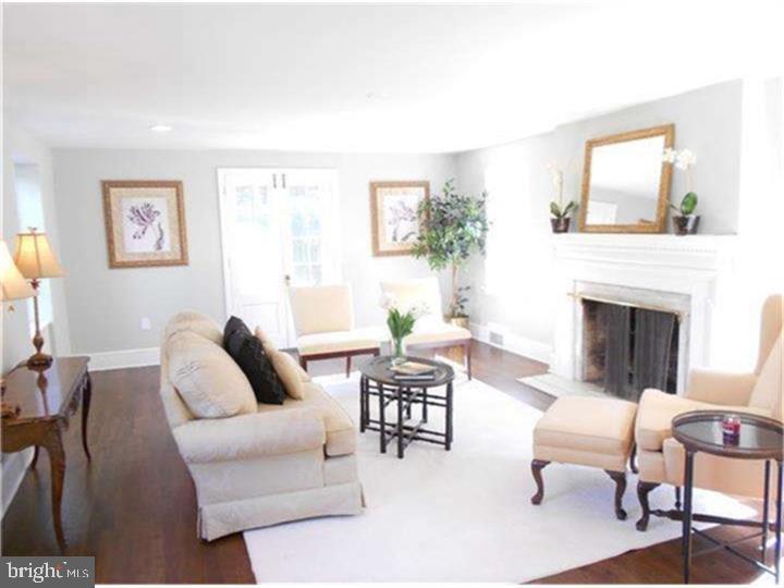 504 Conshohocken State Road Gladwyne, PA 19035 - Photo 13 of 19 a living room with furniture and a fireplace