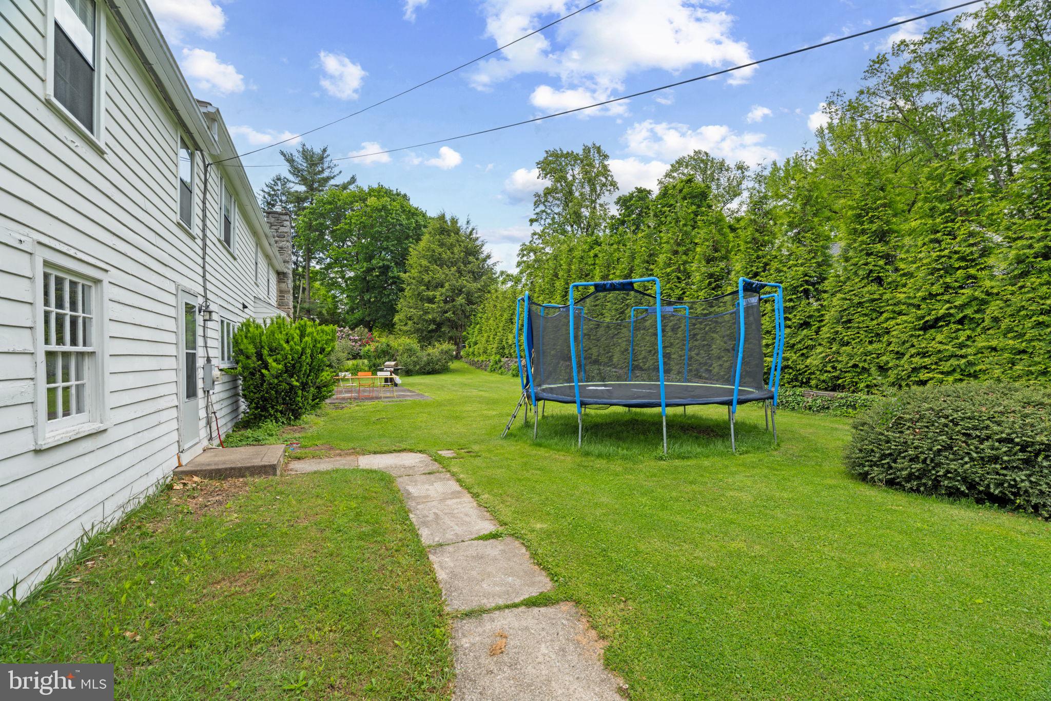 504 Conshohocken State Road Gladwyne, PA 19035 - Photo 9 of 19 a garden view with a seating space