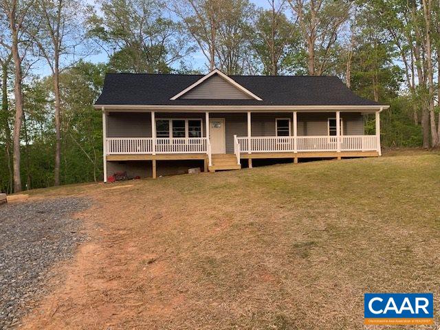 69 Dandelion Road Ruckersville, VA 22968 - Photo 1 of 10 a front view of a house with a garden and porch
