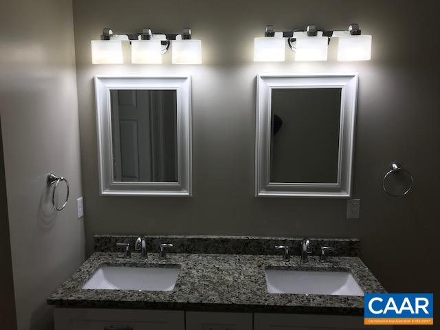 69 Dandelion Road Ruckersville, VA 22968 - Photo 9 of 10 a bathroom with sink and mirror