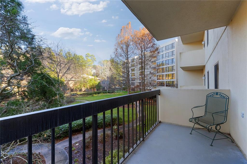 1800 Clairmont Lake, Unit A209 Decatur, GA 30033 - Photo 13 of 35 a view of a chair and table in the balcony