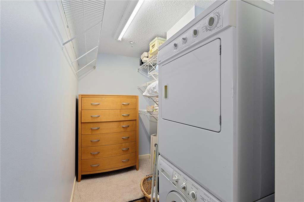 1800 Clairmont Lake, Unit A209 Decatur, GA 30033 - Photo 19 of 35 a view of walk in closet