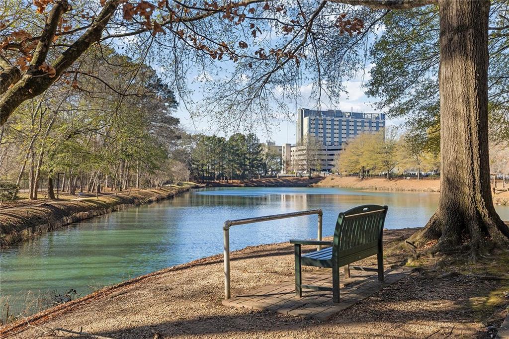 1800 Clairmont Lake, Unit A209 Decatur, GA 30033 - Photo 23 of 35 a view of lake with table and chairs