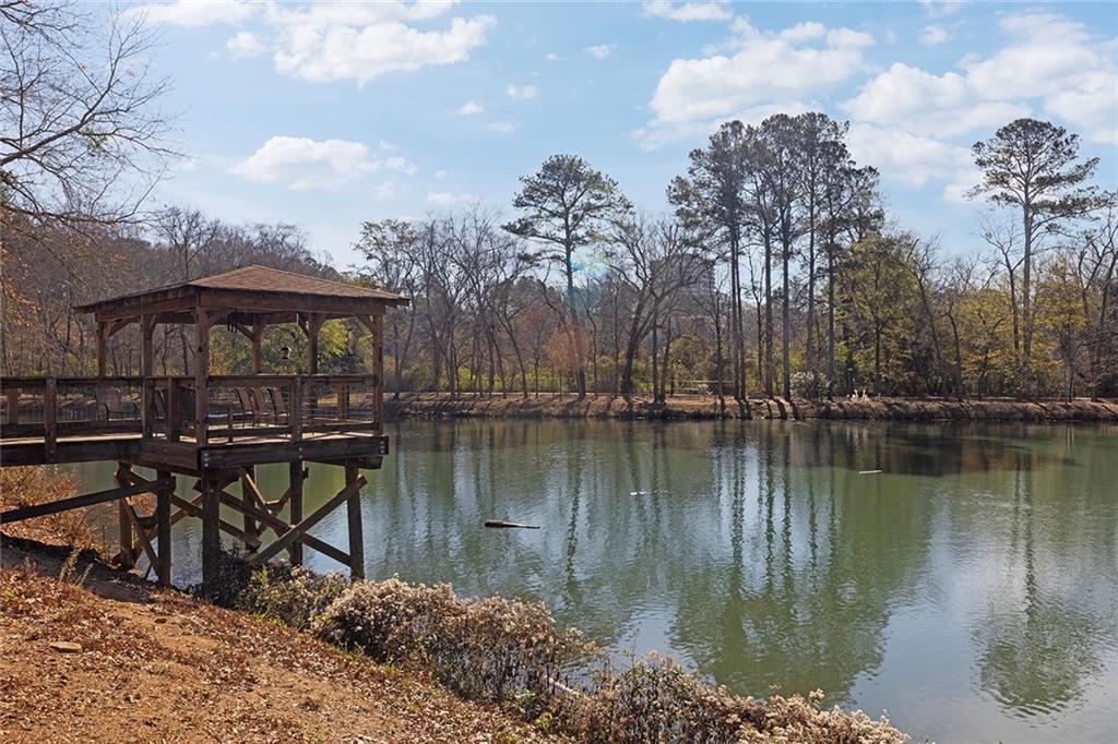 1800 Clairmont Lake, Unit A209 Decatur, GA 30033 - Photo 26 of 35 a view of a lake with outdoor seating