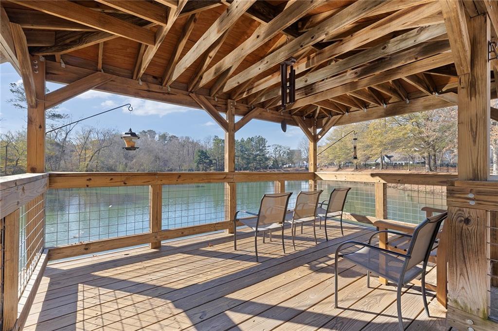 1800 Clairmont Lake, Unit A209 Decatur, GA 30033 - Photo 27 of 35 a patio with glass top table and chairs