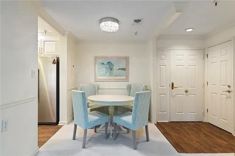 a view of a dining room with furniture