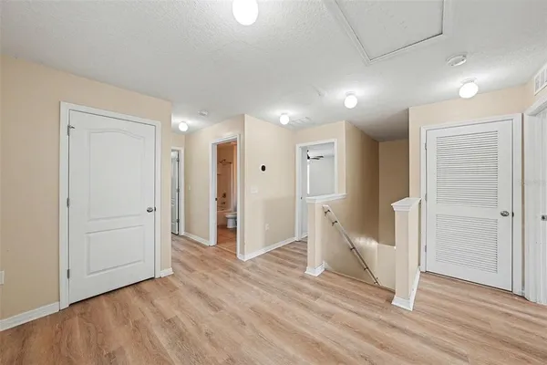 a view of entryway with wooden floor
