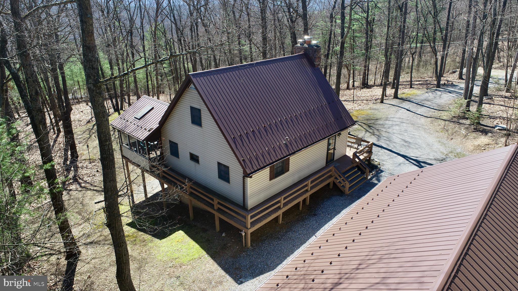 3027 Whitesel Road James Creek, PA 16657 - Photo 32 of 51 a view of a couches on the roof deck
