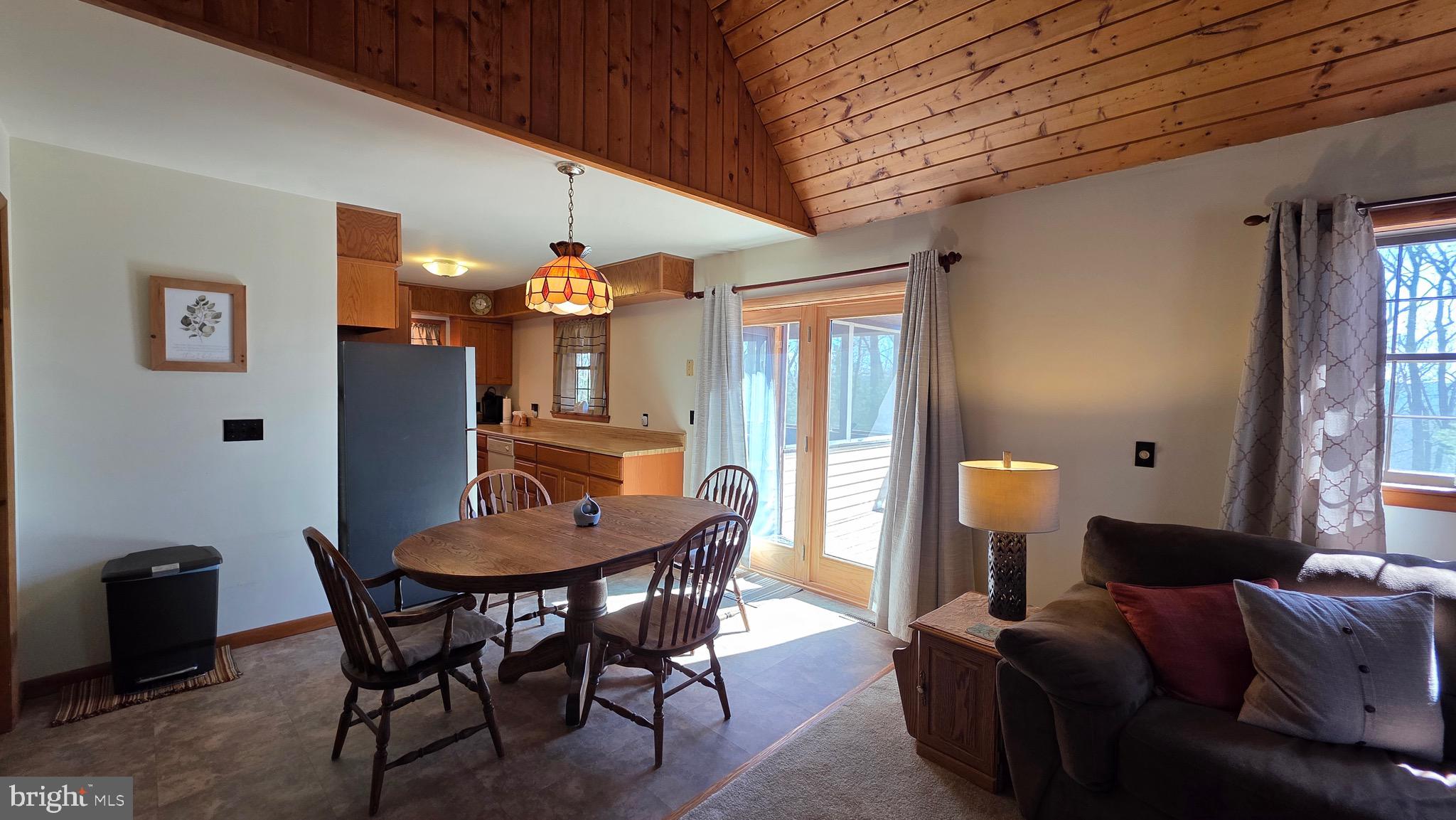 3027 Whitesel Road James Creek, PA 16657 - Photo 8 of 51 a dining room with furniture and window