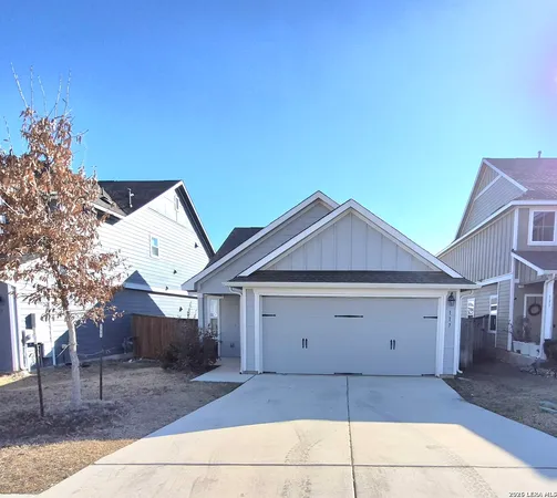 a view of a house with a garage and a garage