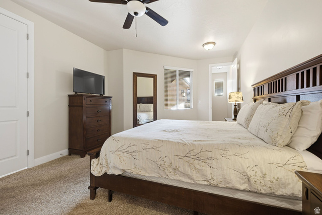 4269 Razor Drive Washington, UT 84780 - Photo 11 of 50 Bedroom featuring light colored carpet and ceiling fan