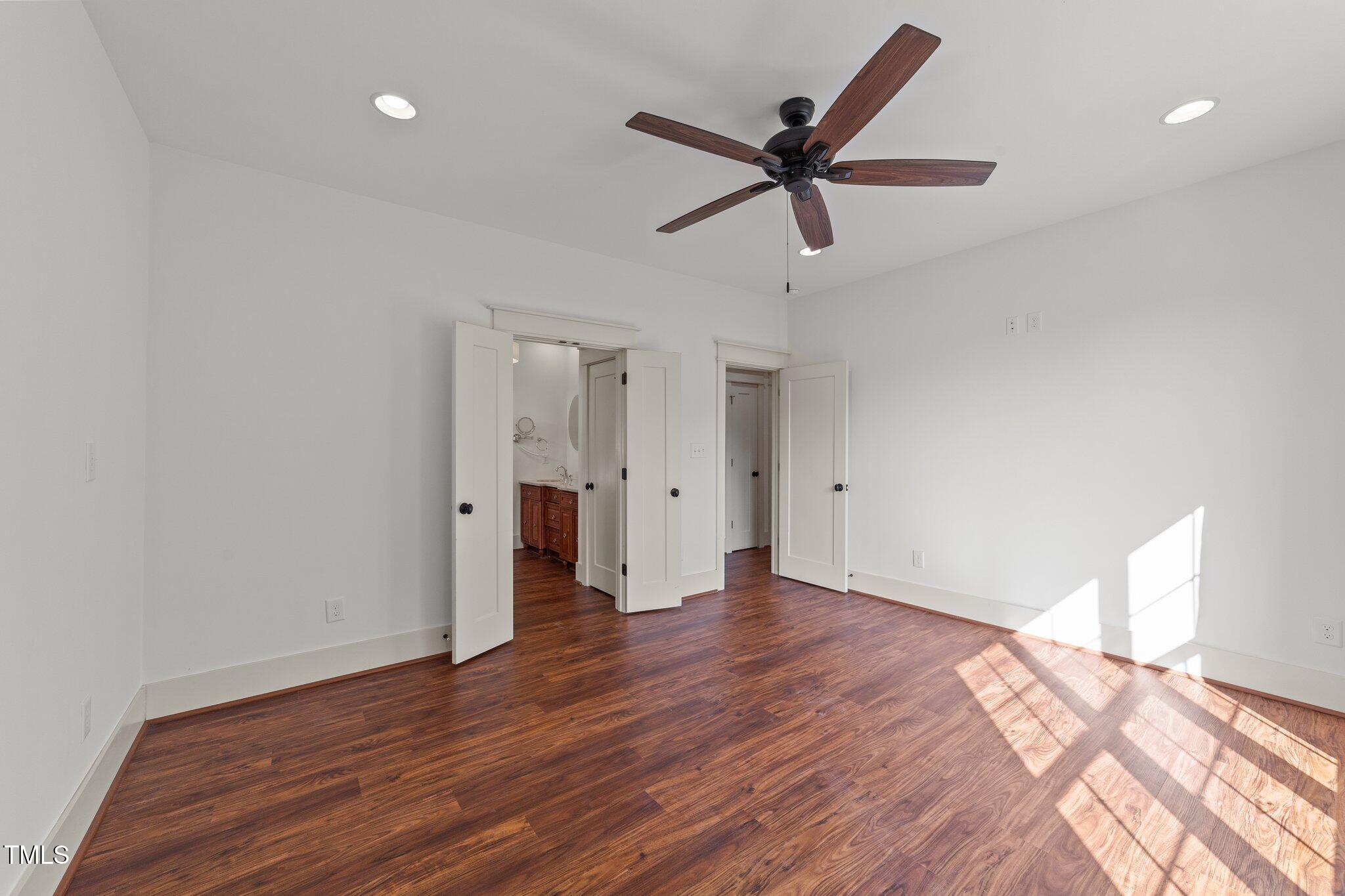 3820 Benson Hardee Road Benson, NC 27504 - Photo 15 of 55 a view of empty room with wooden floor and ceiling fan