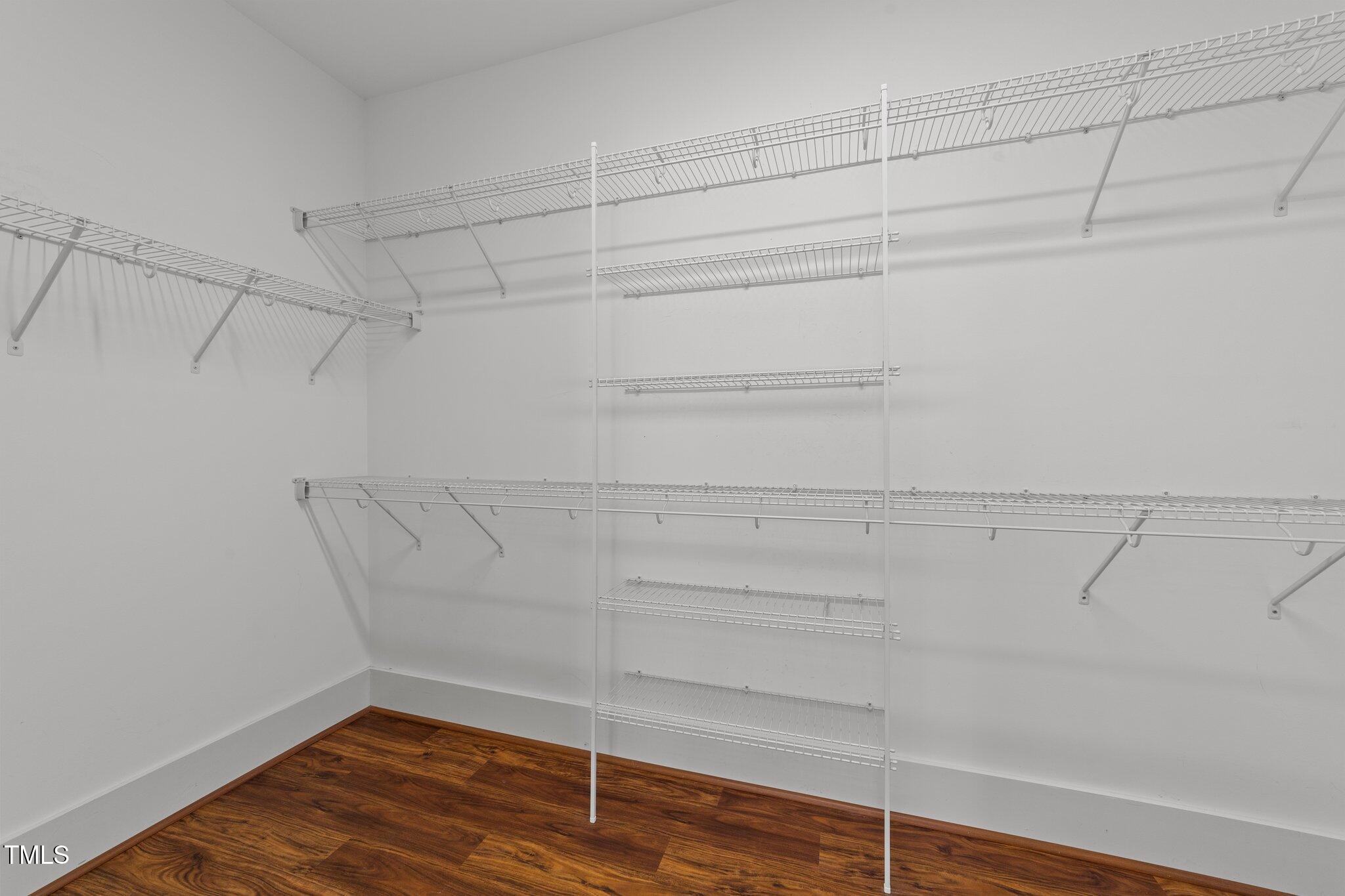 3820 Benson Hardee Road Benson, NC 27504 - Photo 18 of 55 a view of a room with empty racks