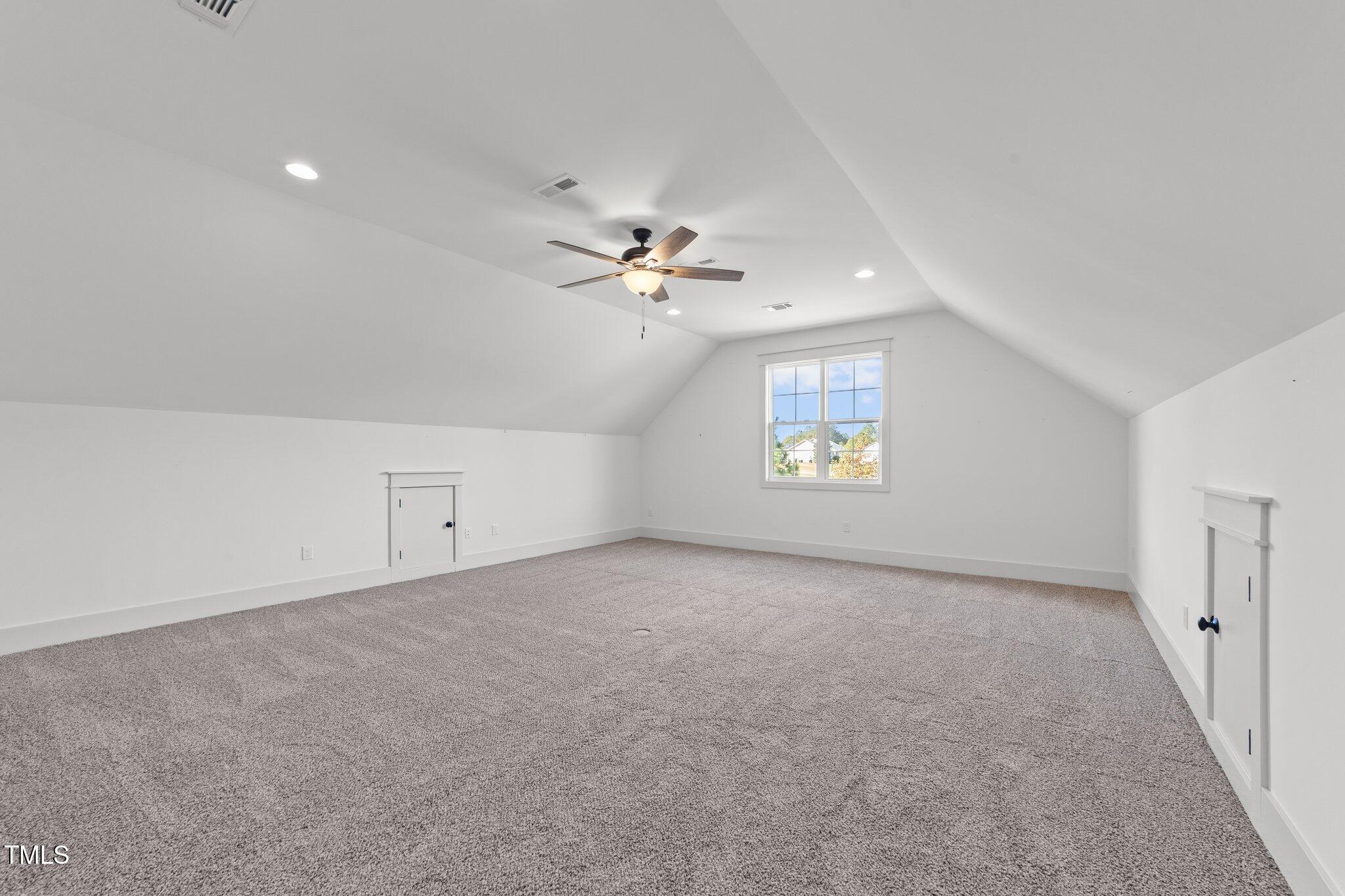 3820 Benson Hardee Road Benson, NC 27504 - Photo 24 of 55 an empty room with fan and windows