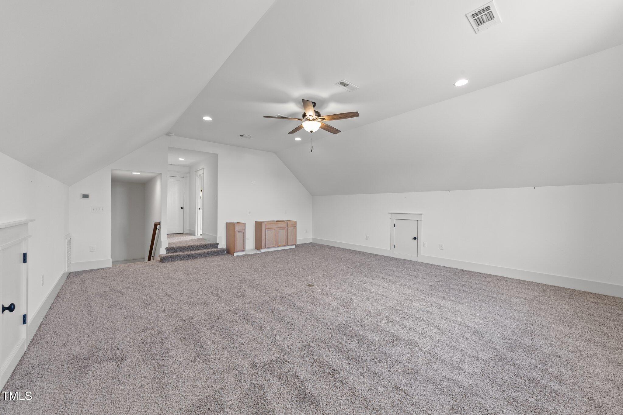 3820 Benson Hardee Road Benson, NC 27504 - Photo 25 of 55 a view of a livingroom with a ceiling fan