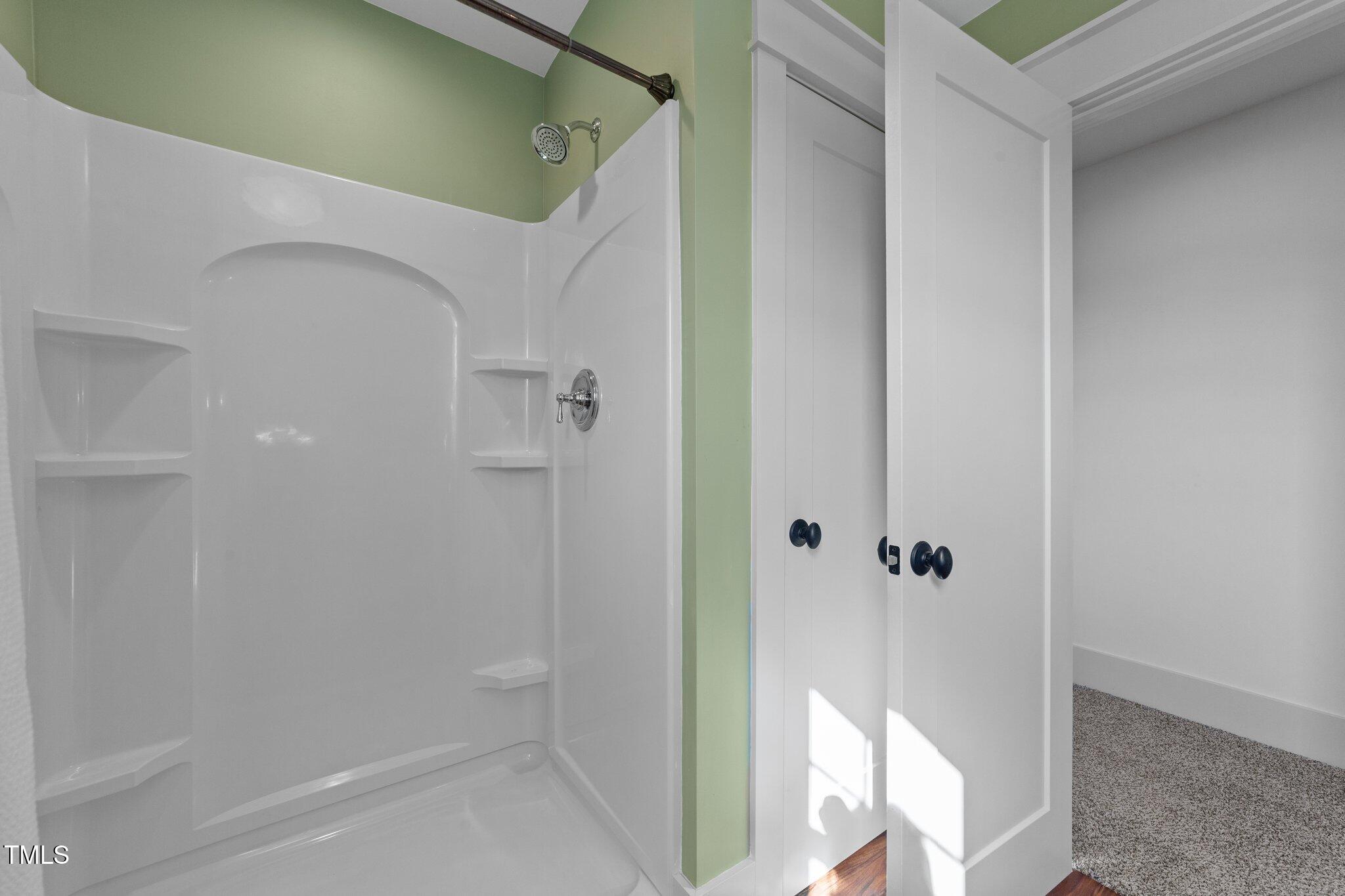 3820 Benson Hardee Road Benson, NC 27504 - Photo 27 of 55 a bathroom with a shower