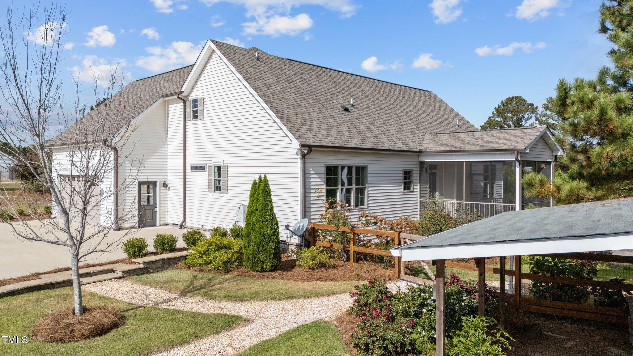 3820 Benson Hardee Road Benson, NC 27504 - Photo 36 of 55 a front view of house with yard and outdoor seating