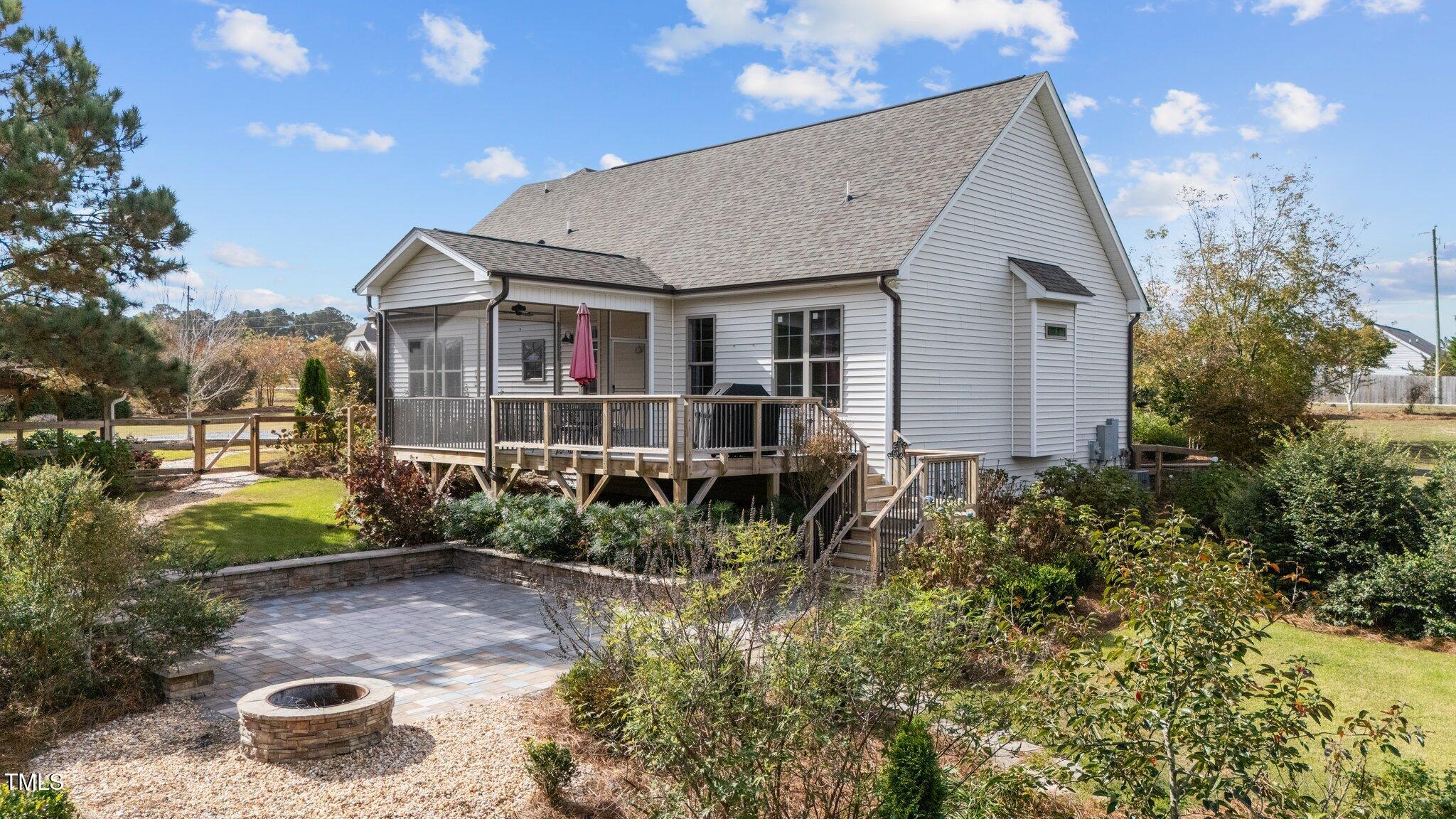 3820 Benson Hardee Road Benson, NC 27504 - Photo 38 of 55 a front view of a house with yard and trees