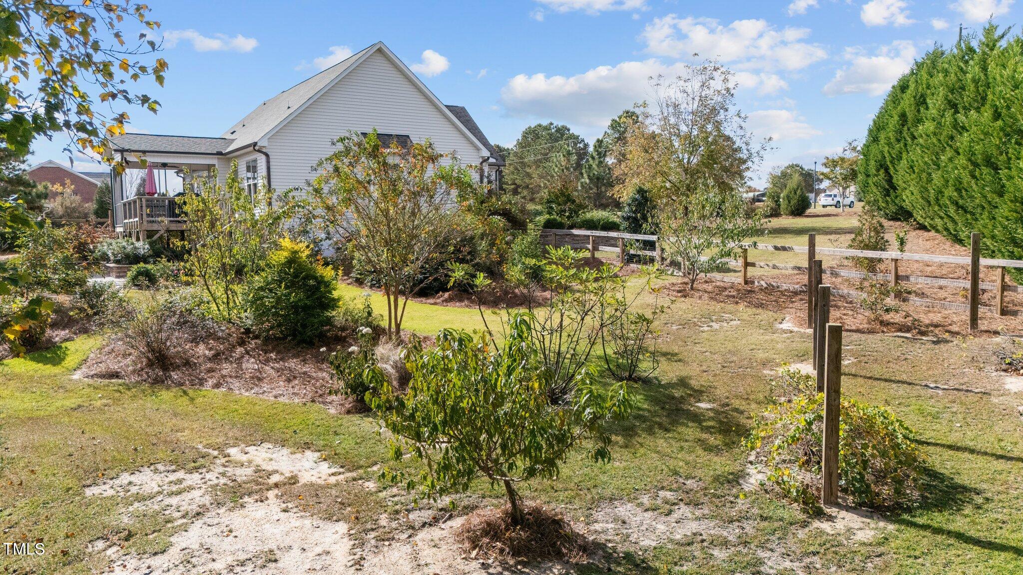 3820 Benson Hardee Road Benson, NC 27504 - Photo 40 of 55 a view of a back yard of the house