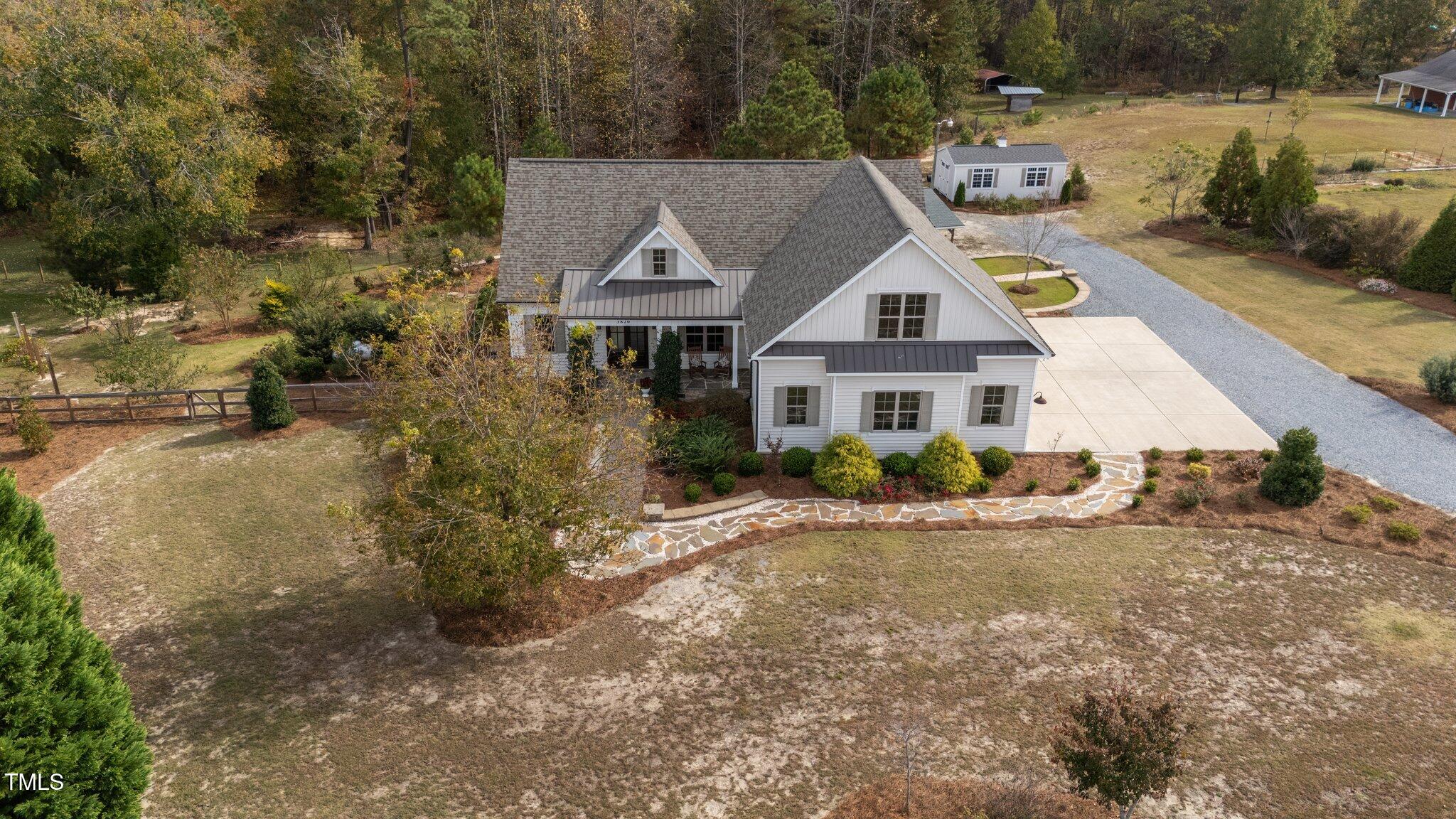 3820 Benson Hardee Road Benson, NC 27504 - Photo 43 of 55 a front view of a house with a yard