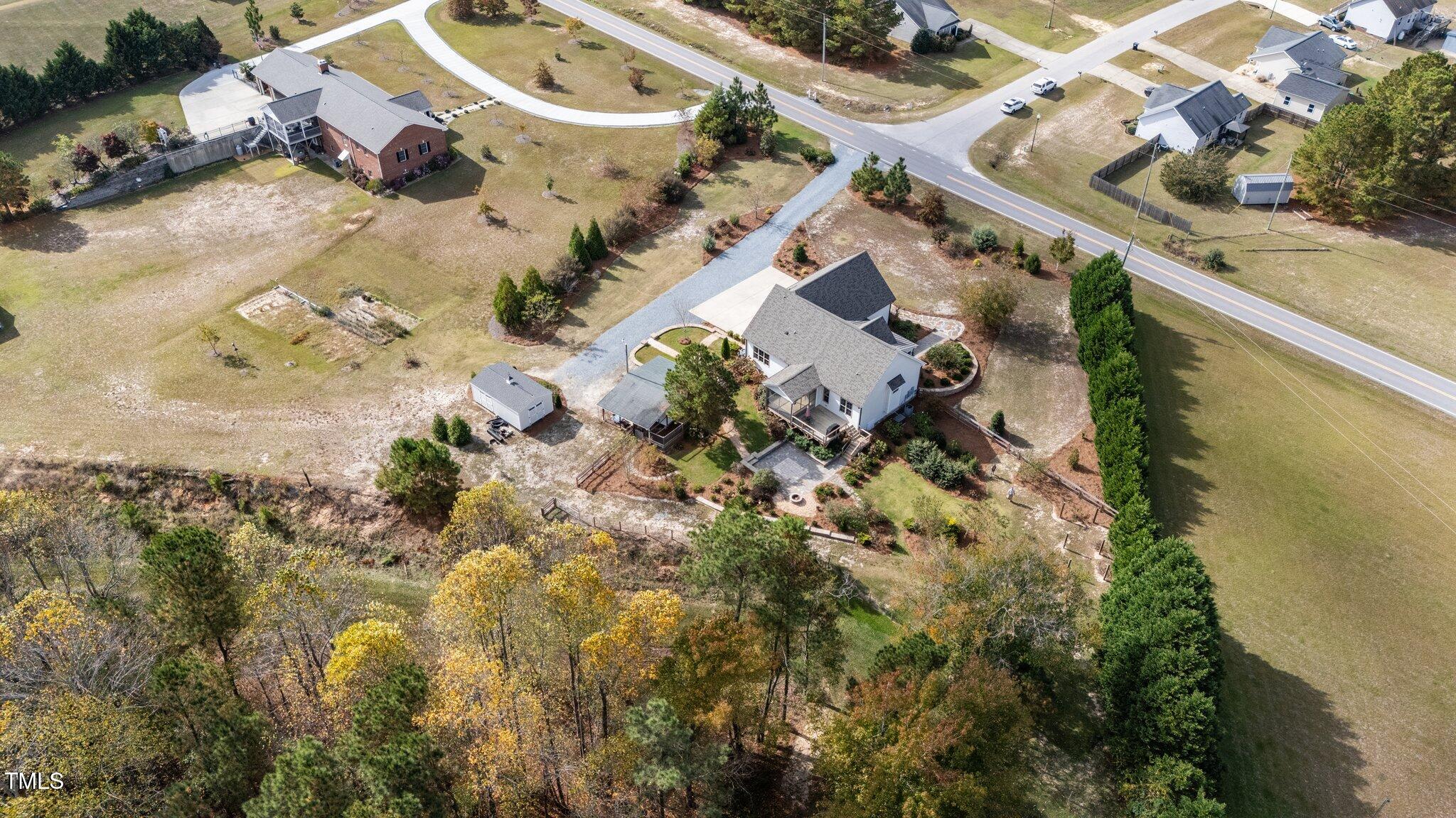 3820 Benson Hardee Road Benson, NC 27504 - Photo 51 of 55 an aerial view of residential houses with outdoor space