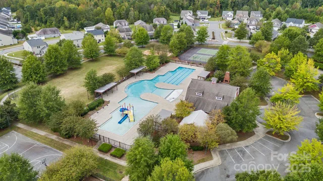 an aerial view of residential house with outdoor space
