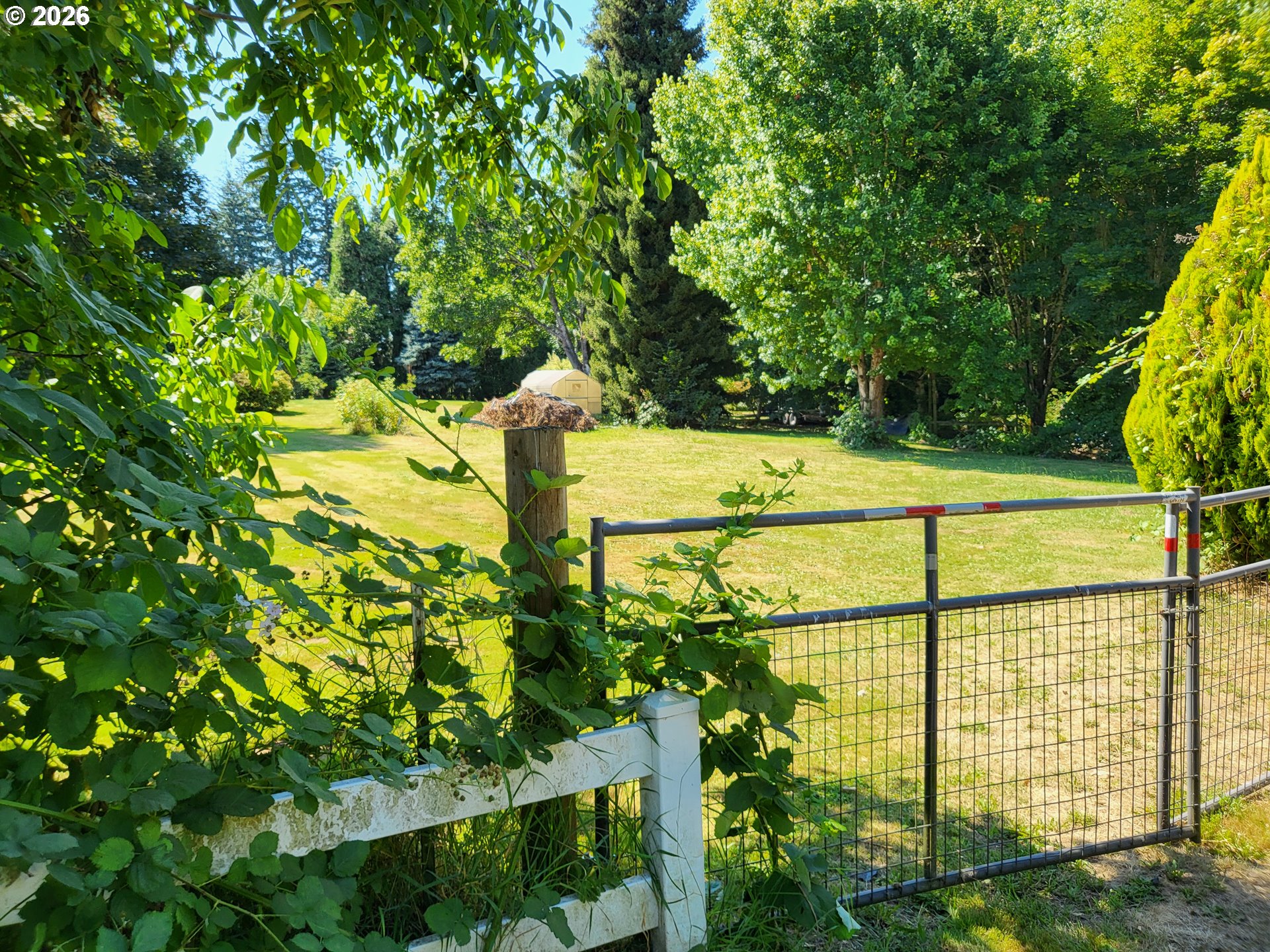 7137 Southeast 322 Avenue Gresham, OR 97080 - Photo 2 of 5 a view of a tennis court