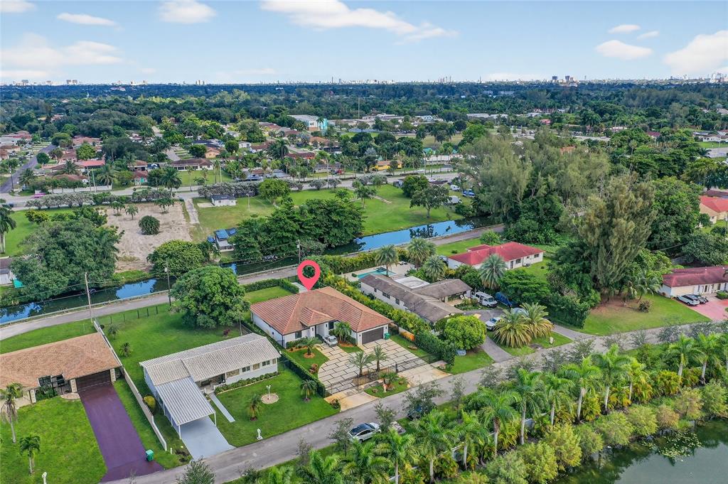11405 East Golf Drive Miami, FL 33167 - Photo 18 of 25 an aerial view of a house with a garden