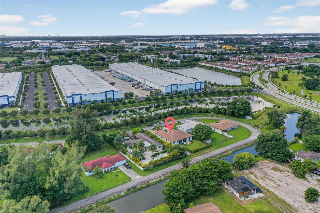 11405 East Golf Drive Miami, FL 33167 - Photo 20 of 25 an aerial view of a city