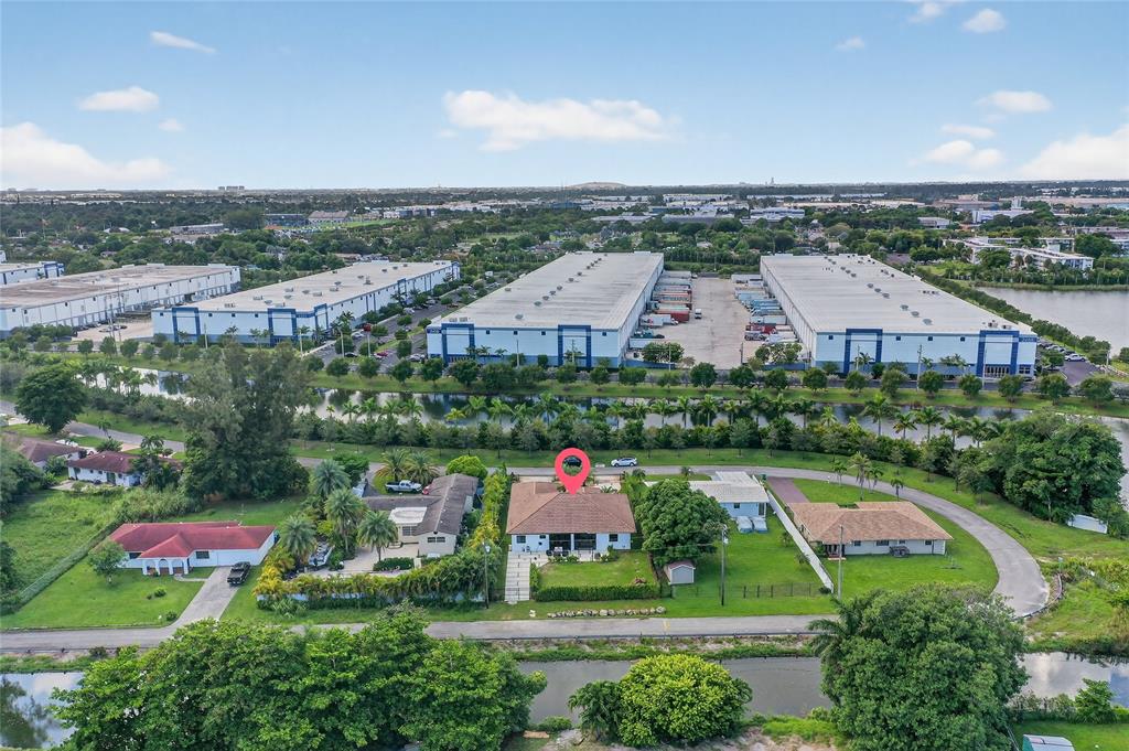 11405 East Golf Drive Miami, FL 33167 - Photo 22 of 25 an aerial view of multiple house