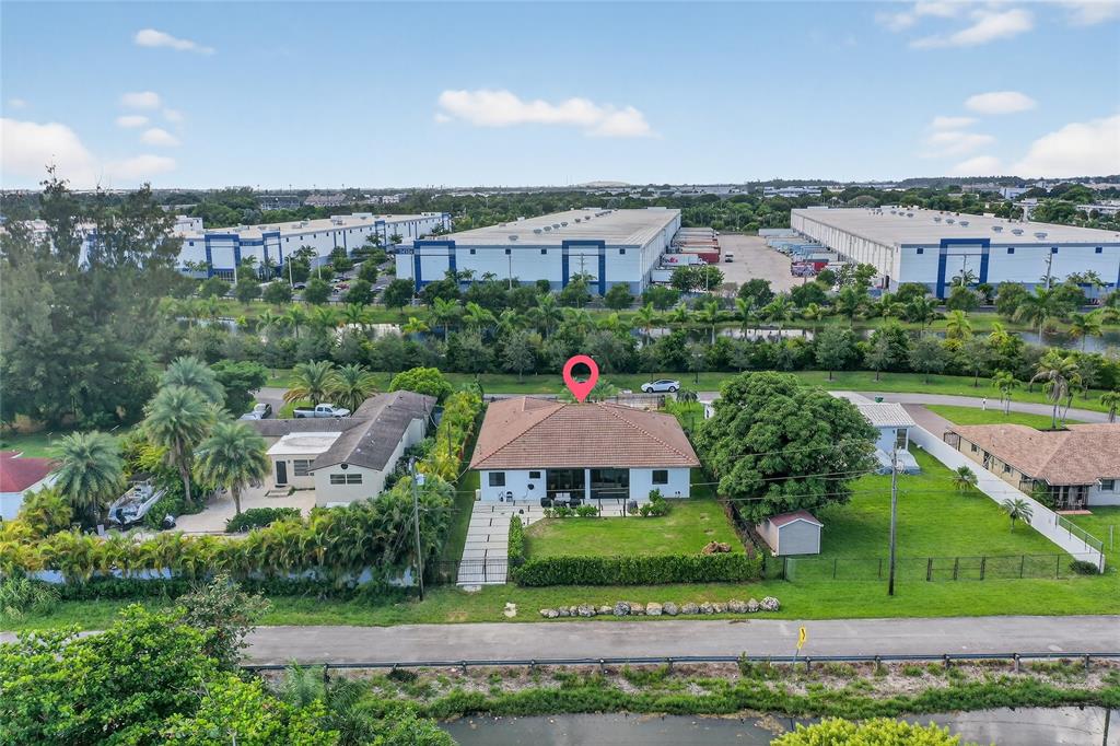 11405 East Golf Drive Miami, FL 33167 - Photo 24 of 25 an aerial view of a house with a garden
