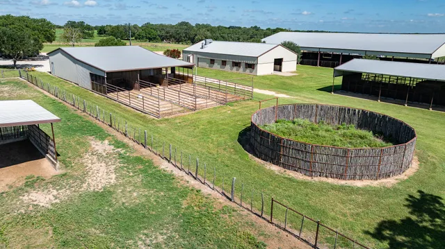 a view of a backyard with sitting area