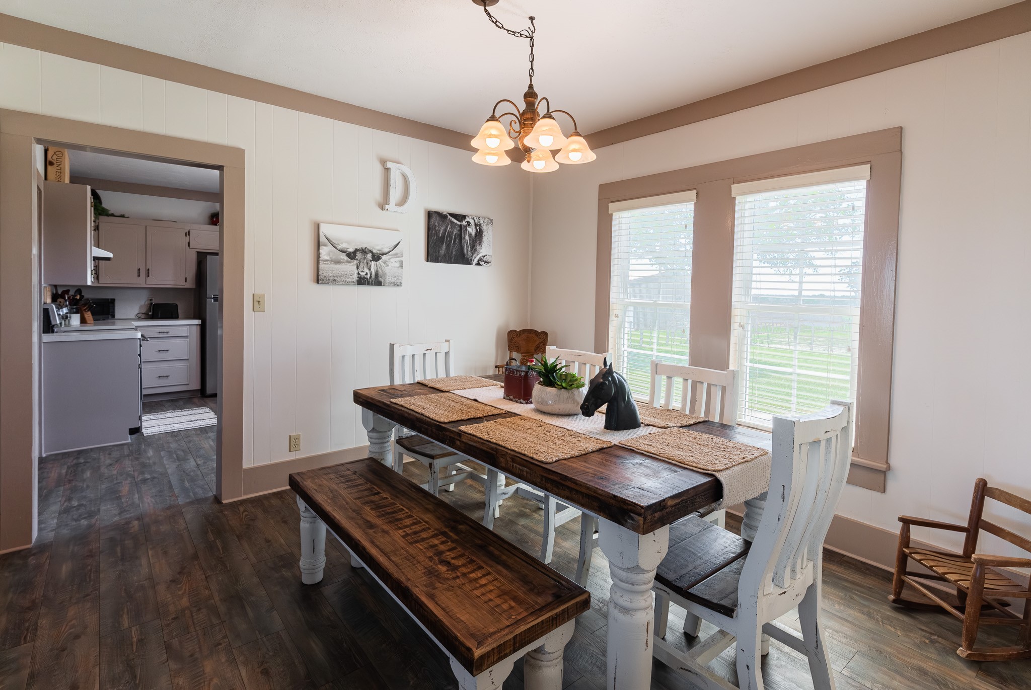 1119 Wolters Road Schulenburg, TX 78956 - Photo 42 of 50 a view of a dining room with furniture window and wooden floor