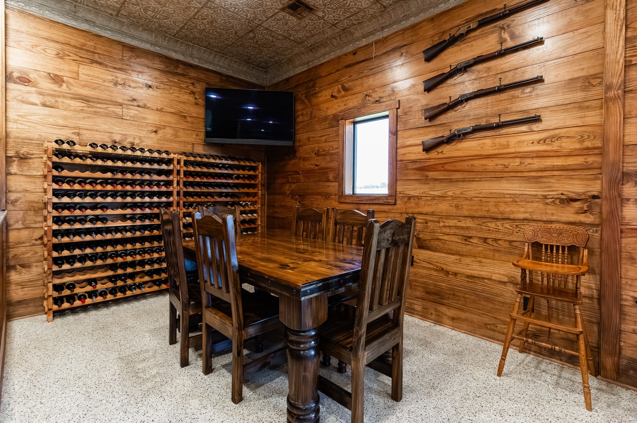 1119 Wolters Road Schulenburg, TX 78956 - Photo 6 of 50 a view of a patio with table and chairs with wooden floor and fence