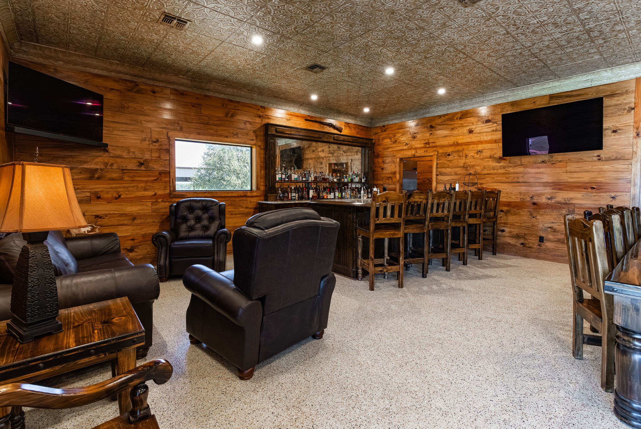 1119 Wolters Road Schulenburg, TX 78956 - Photo 10 of 50 a living room with furniture a flat screen tv and a window