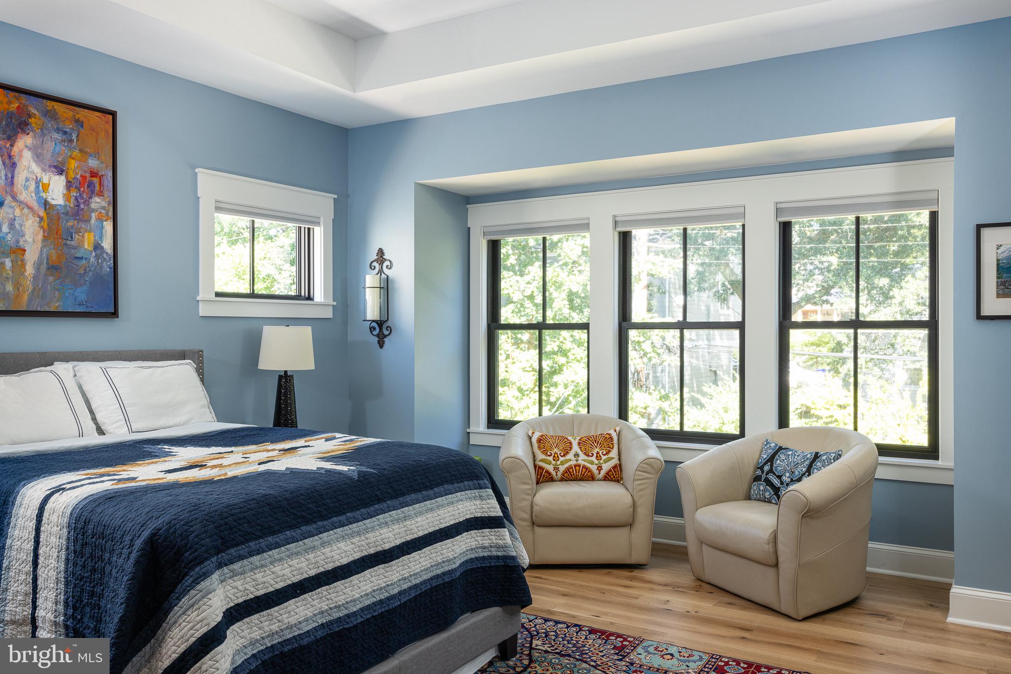 4905 16th Road North Arlington, VA 22207 - Photo 16 of 19 Serene blue bedroom with natural light.