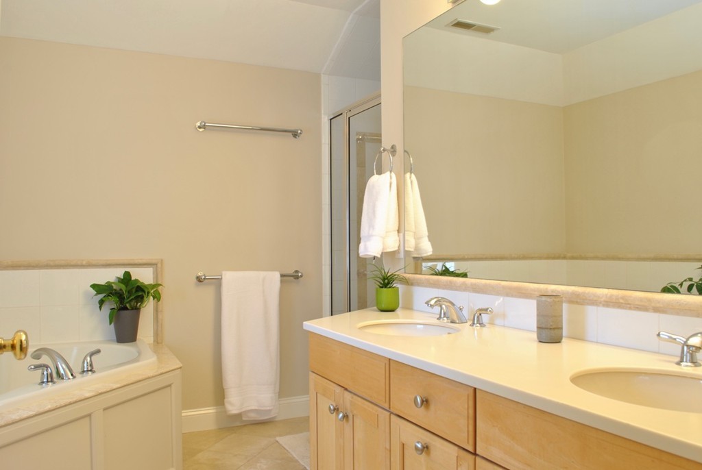 17 Giles Road Lincoln, MA 01773 - Photo 11 of 18 a bathroom with a sink and a mirror