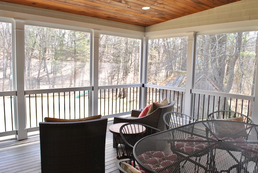 17 Giles Road Lincoln, MA 01773 - Photo 16 of 18 a living room with furniture and a large window