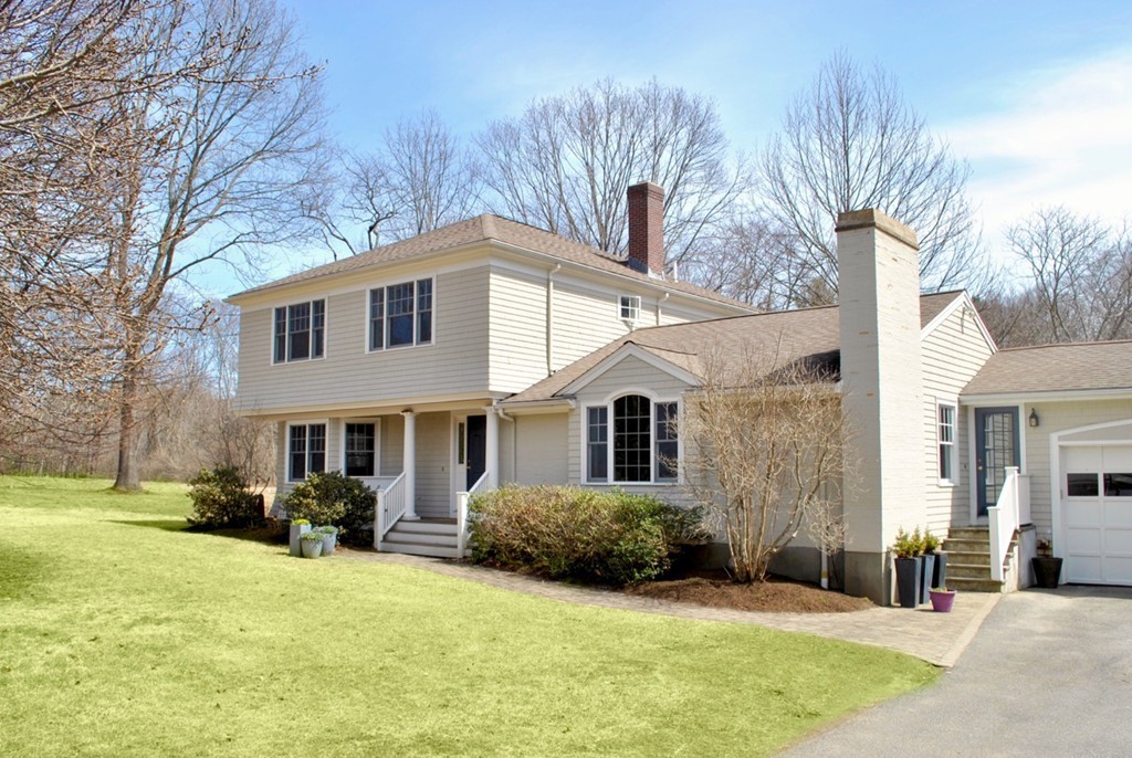 17 Giles Road Lincoln, MA 01773 - Photo 18 of 18 a front view of a house with a yard outdoor seating and yard