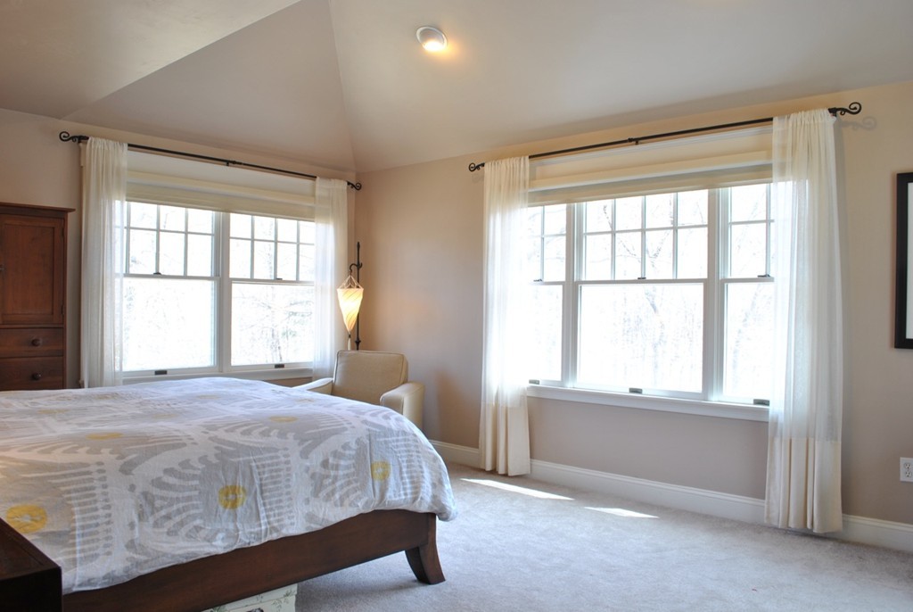 17 Giles Road Lincoln, MA 01773 - Photo 10 of 18 a bedroom with a bed and a window