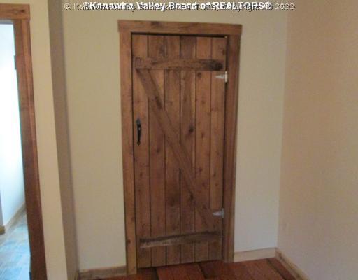 818 Honeysuckle Road Elkview, WV 25071 - Photo 15 of 16 Other. THE RUSTIC INTERIOR DOORS WERE CUSTOM MADE.