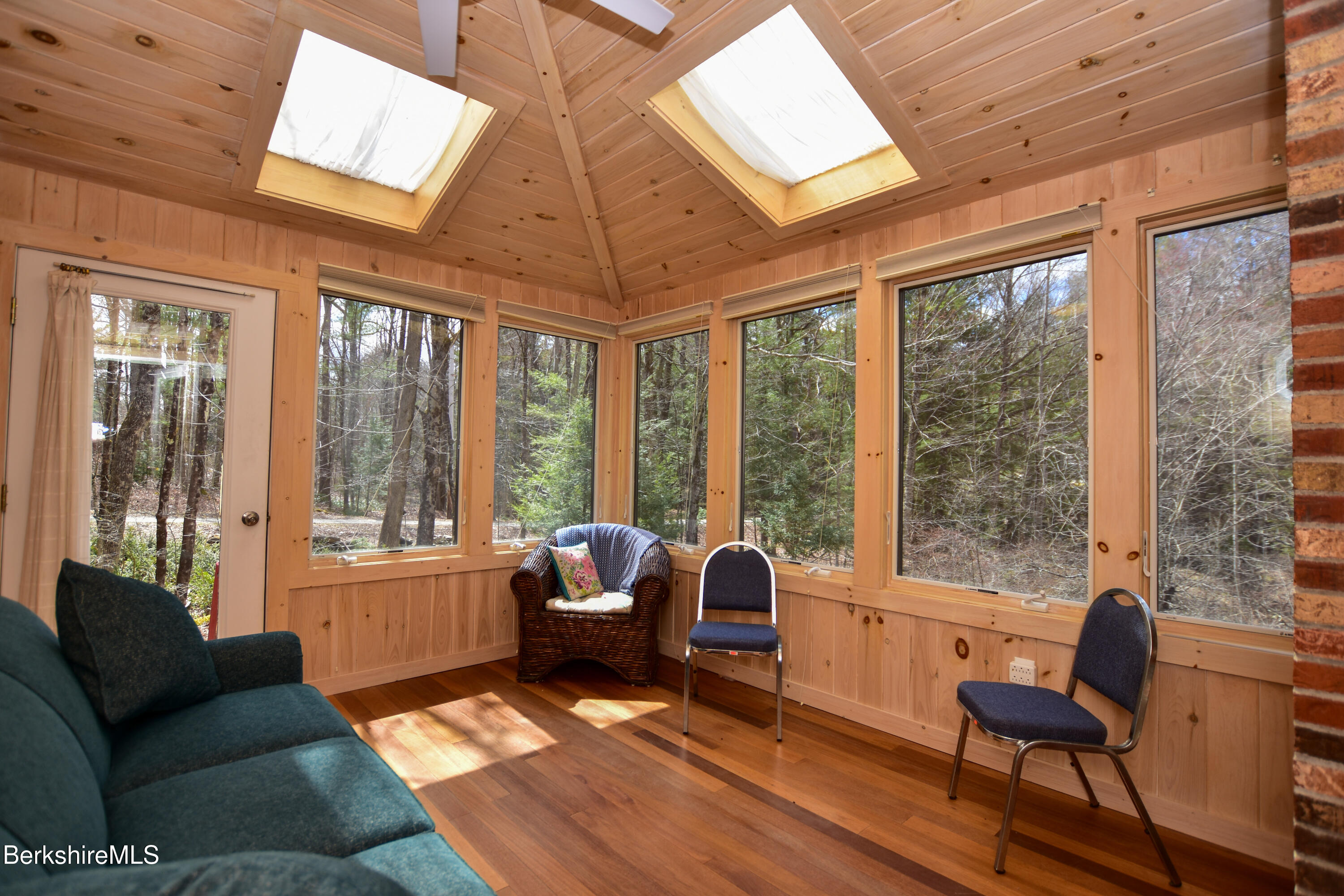 283 Benton Hill Road Becket, MA 01223 - Photo 10 of 55 a living room with furniture and a large window