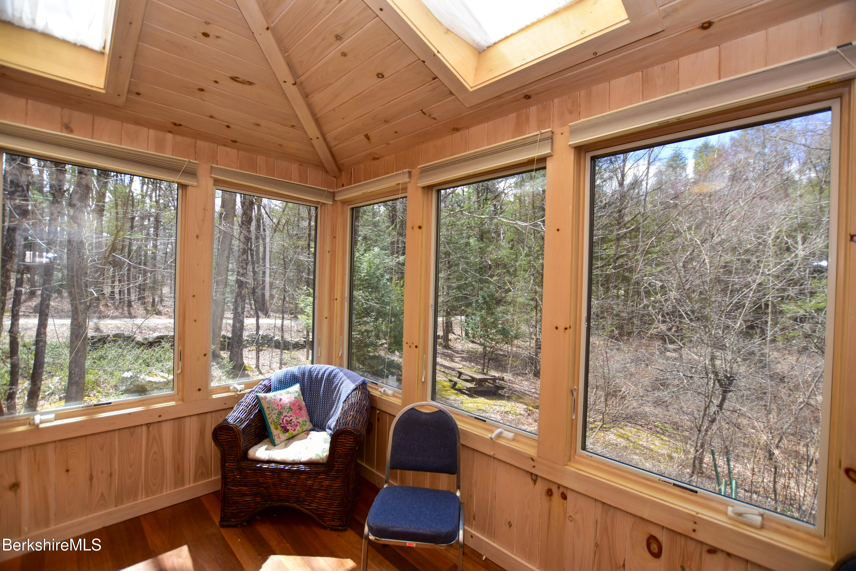283 Benton Hill Road Becket, MA 01223 - Photo 11 of 55 a living room with furniture and windows