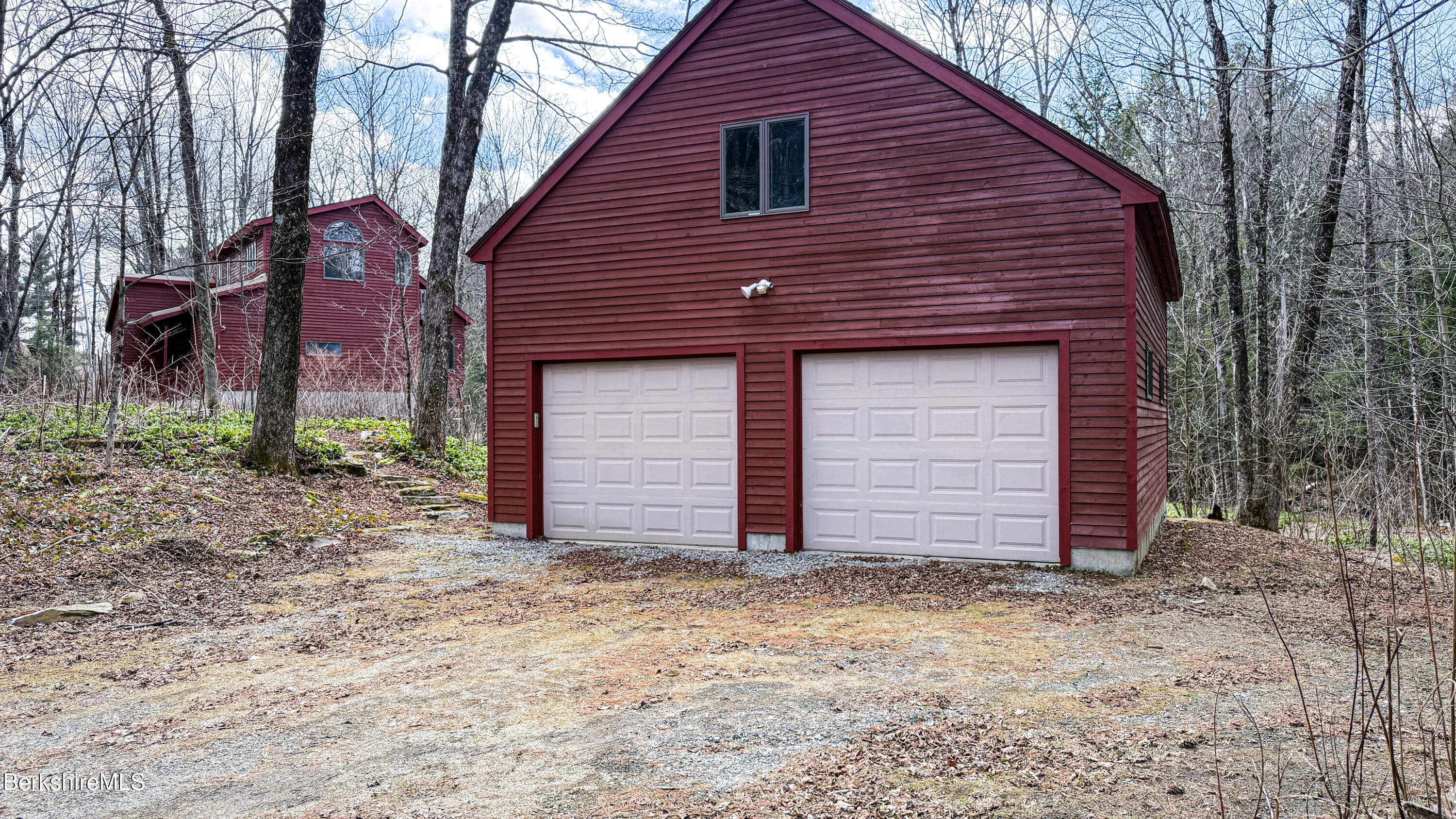 283 Benton Hill Road Becket, MA 01223 - Photo 3 of 55 a front view of a house