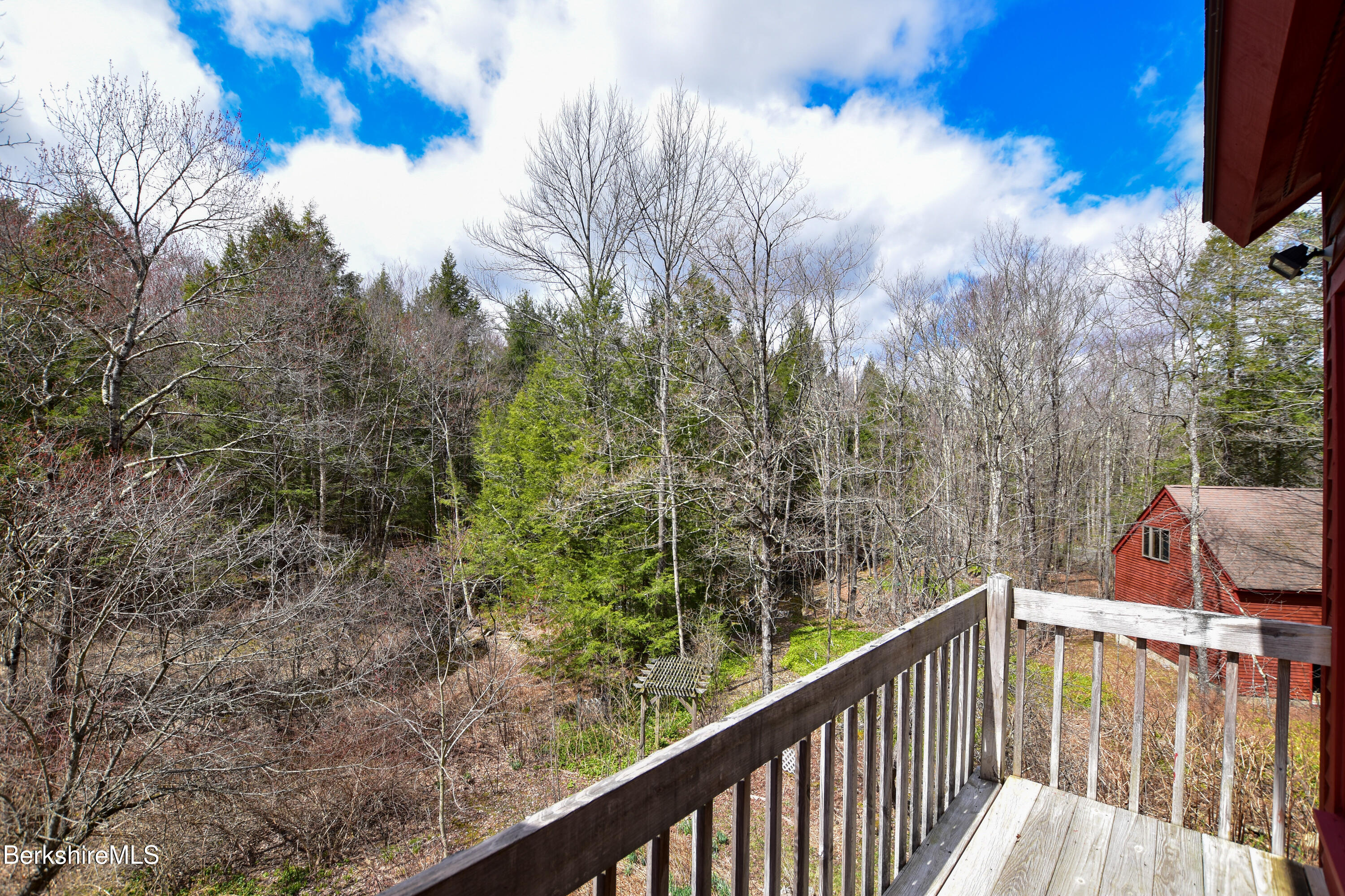 283 Benton Hill Road Becket, MA 01223 - Photo 36 of 55 a balcony with an outdoor space