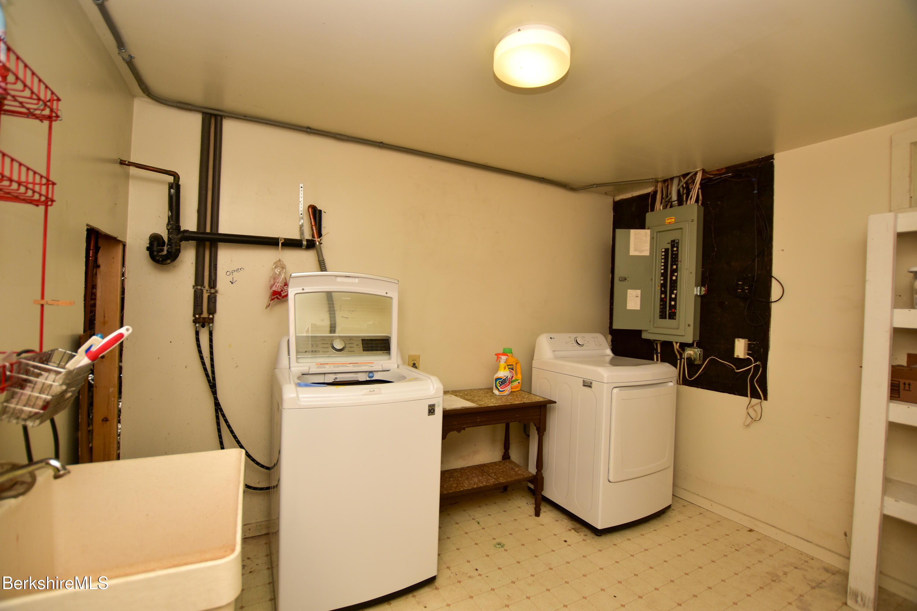 283 Benton Hill Road Becket, MA 01223 - Photo 43 of 55 a utility room with dryer and washer