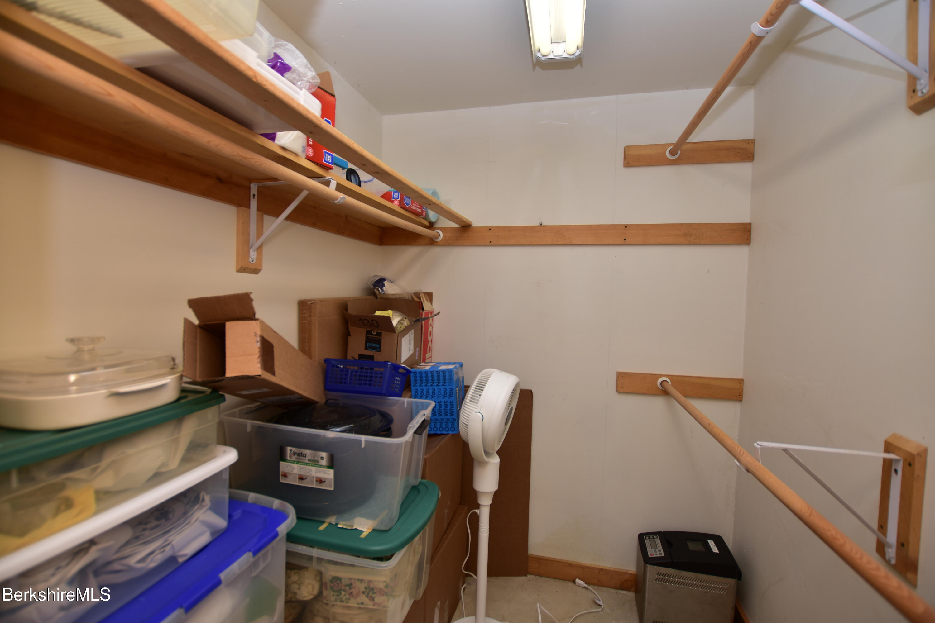 283 Benton Hill Road Becket, MA 01223 - Photo 44 of 55 a work room with furniture and wooden floor